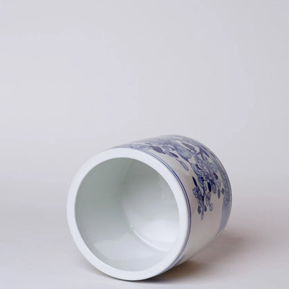 Cache-pot oiseau sur branche fleurie